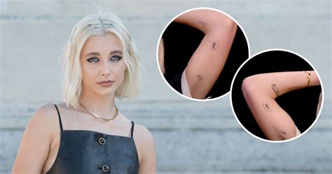 Alex Bovaird designed the costumes for seasons one and two of The White Lotus, and already proved herself adept at dressing Gen-Z with the first seasons disaffected, too-cool-for-their-own-good. . Emma chamberlain tattoo